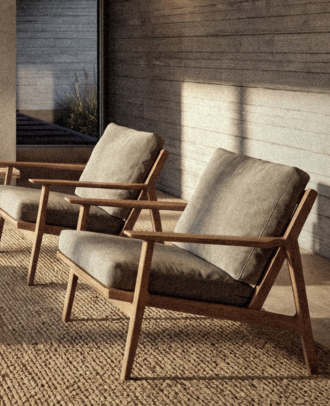 Rendering of two timber lounge chairs on a woven rug